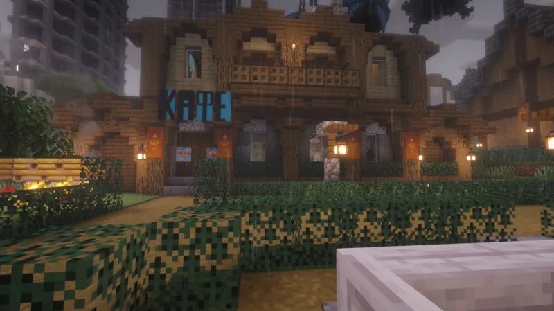 Деревянное кафе Nexus Cafe в Minecraft с вывеской и баннерами