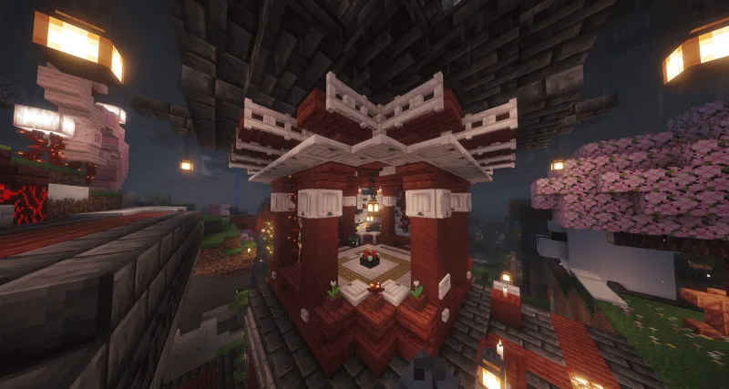 Чаровальный стол в виде японской пагоды из красного дерева в Minecraft ночью