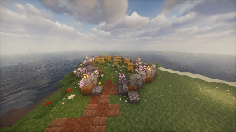 Остров в Minecraft с ульями, цветами, каменными блоками и фонарями у воды