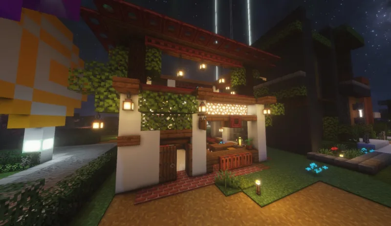 Бар в Minecraft ночью с фонарями, деревянными балками и плющом на фасаде
