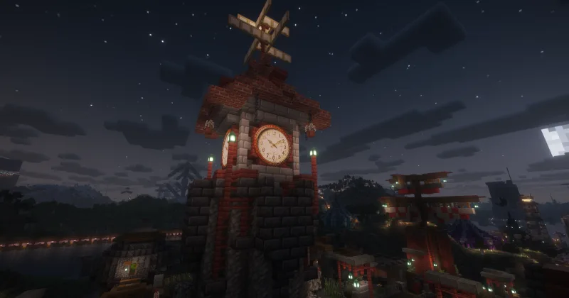 Башня с часами и постройки Алой Деревни в Minecraft ночью
