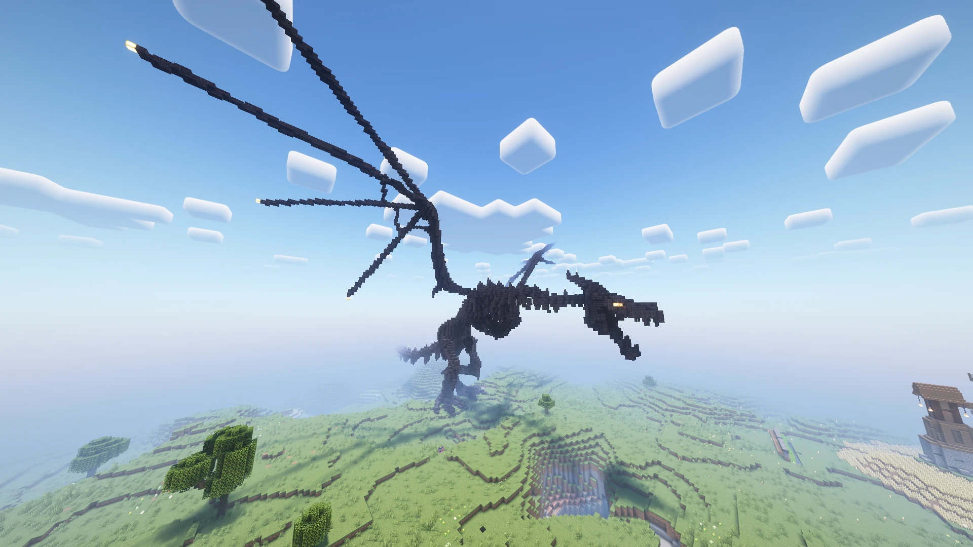 Статуя чёрного эндер дракона с расправленными крыльями над равниной в Minecraft